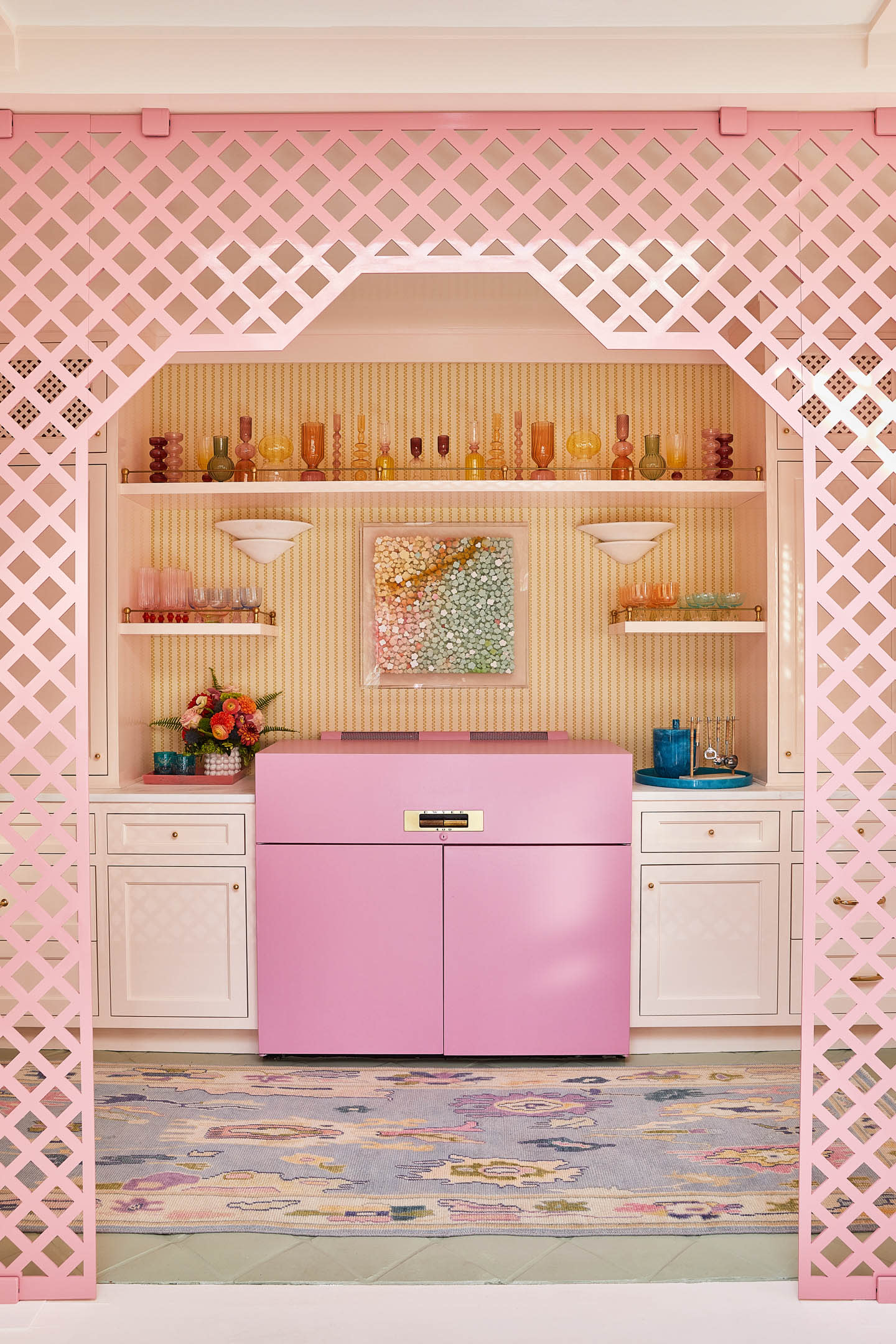 kitchenette with pink oven